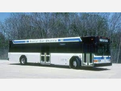 DFW Buys Four New CNG Buses for Rental Car Facility